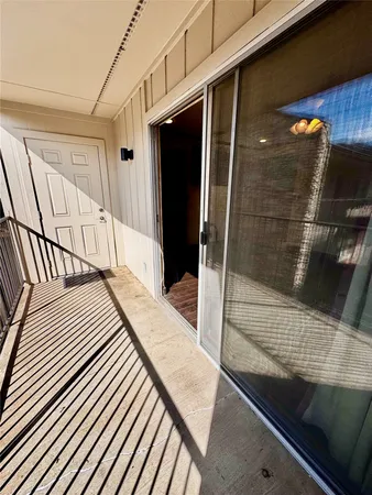 a balcony view with a sink