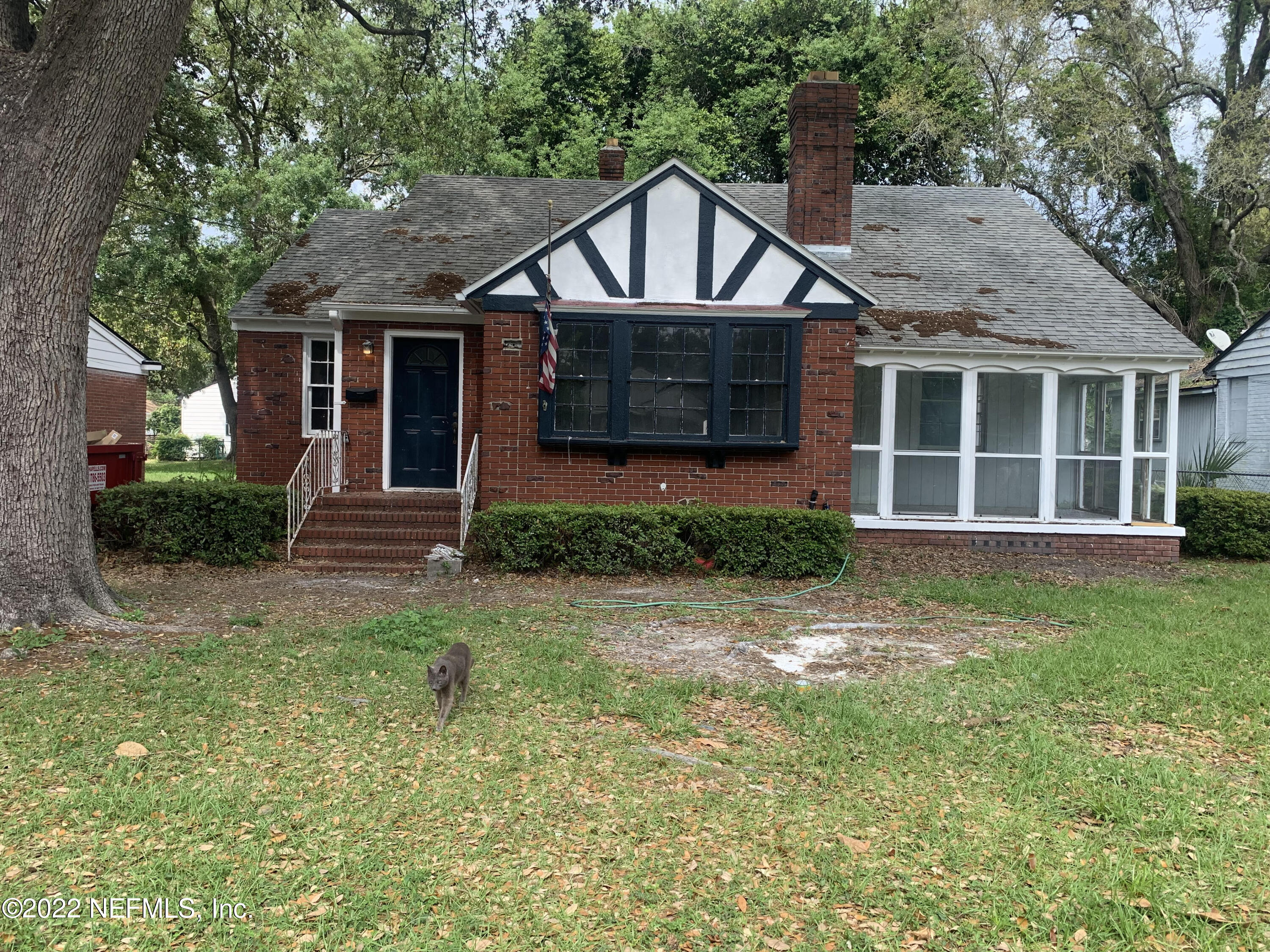 1639 Parrish Place Jacksonville, FL 32205 - Photo 1 of 1 a front view of a house with a yard