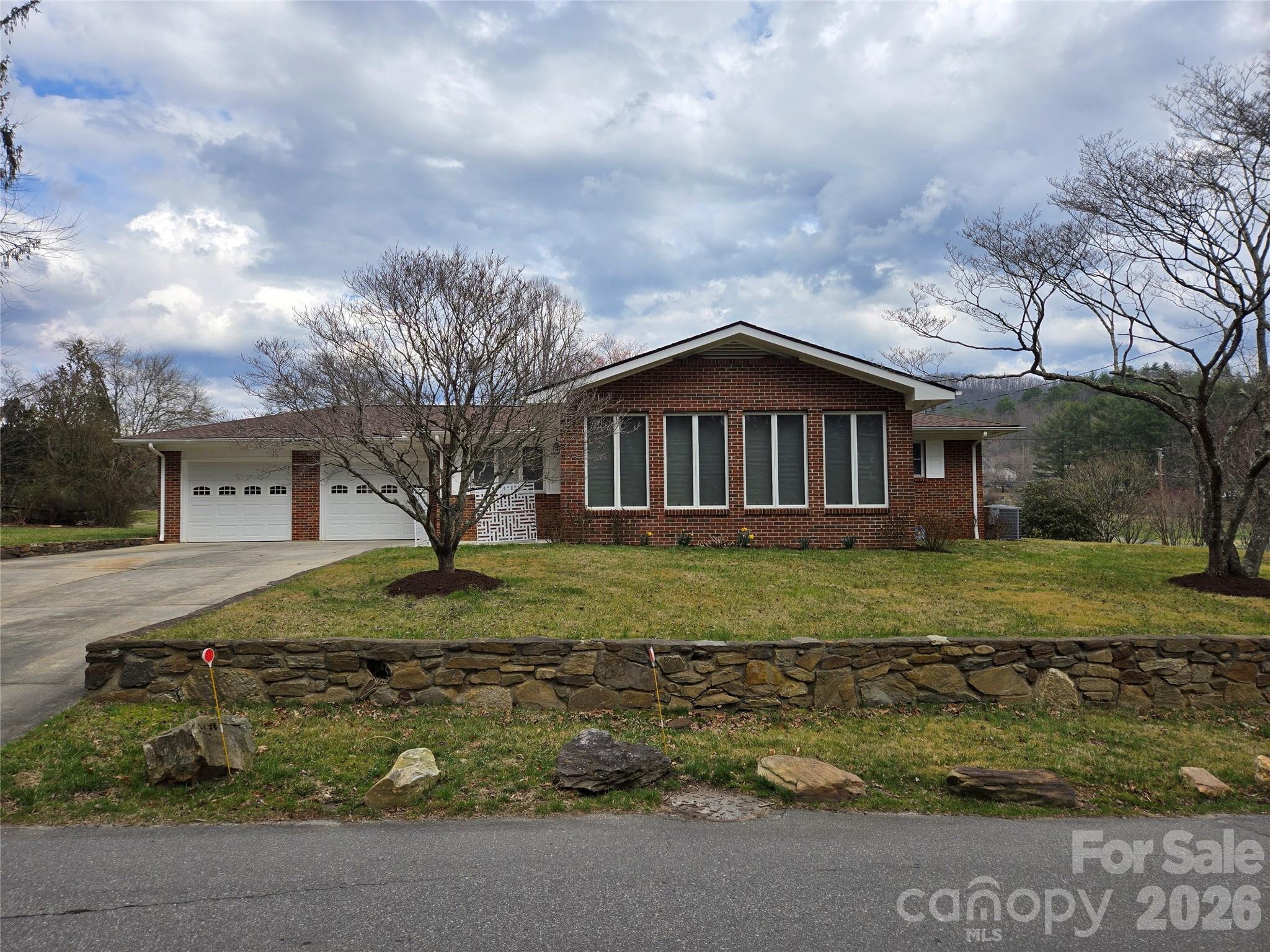 100 Chapel Road Black Mountain, NC 28711 - Photo 2 of 30 a front view of a house with a yard
