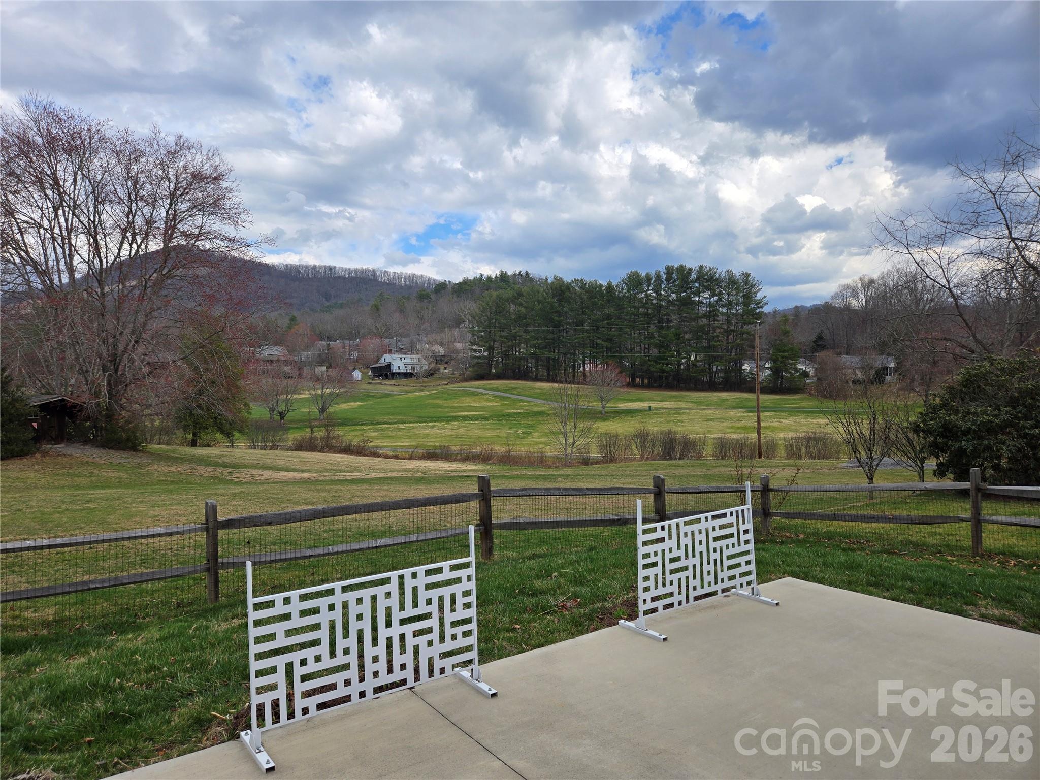 100 Chapel Road Black Mountain, NC 28711 - Photo 27 of 30 a view of a green field with sitting area