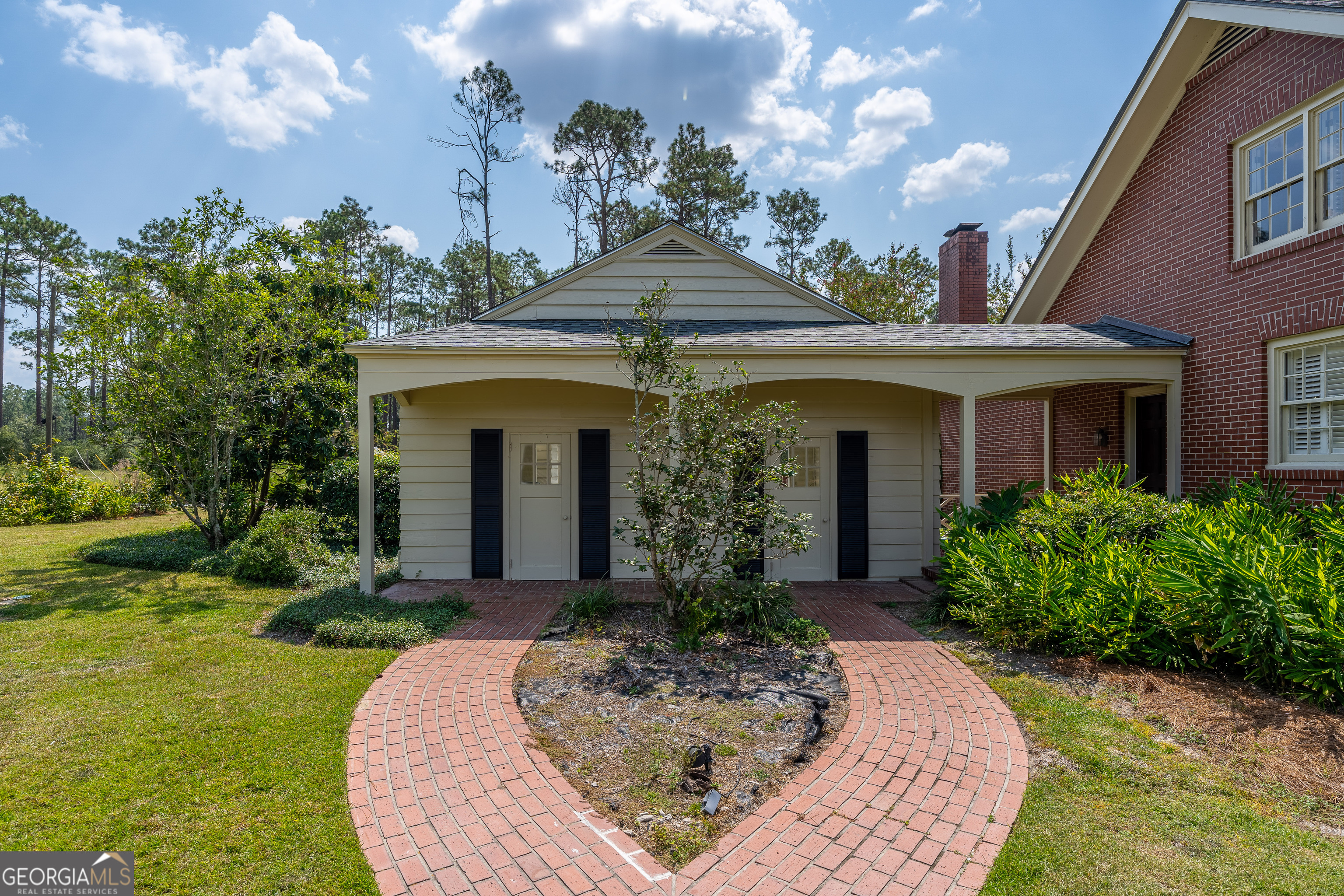 1602 Ward St Extension West Douglas, GA 31533 - Photo 10 of 70 a front view of a house with garden
