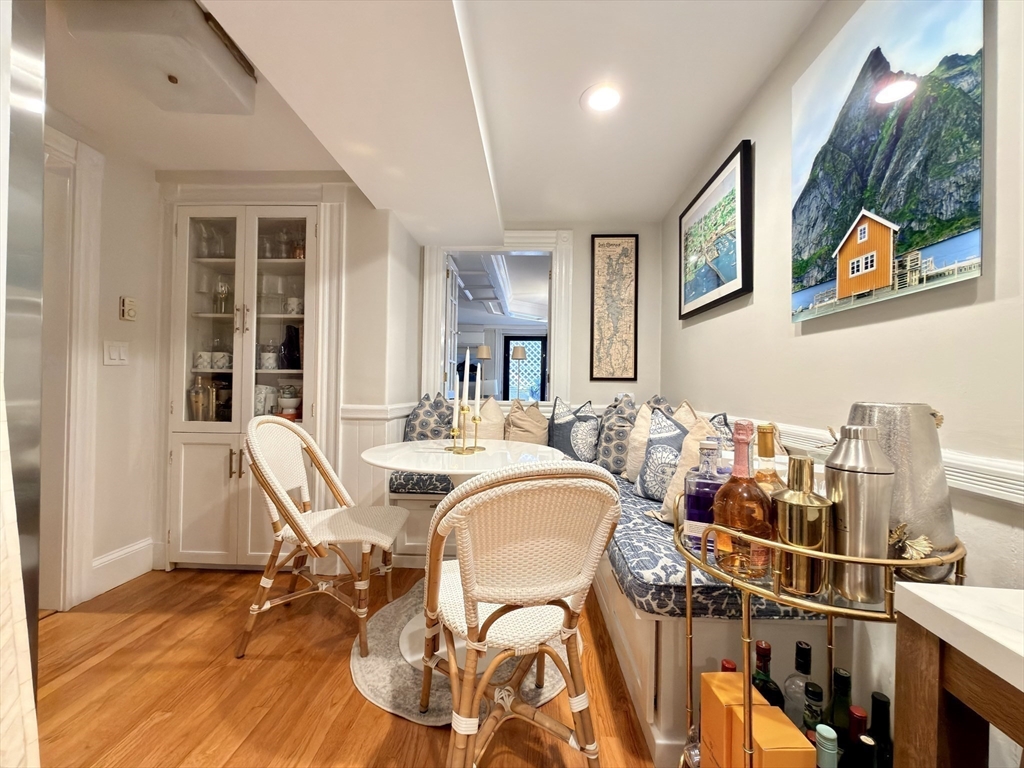 41 Pinckney Street, Unit B Boston, MA 02114 - Photo 6 of 31 a view of a dining room with furniture and wooden floor