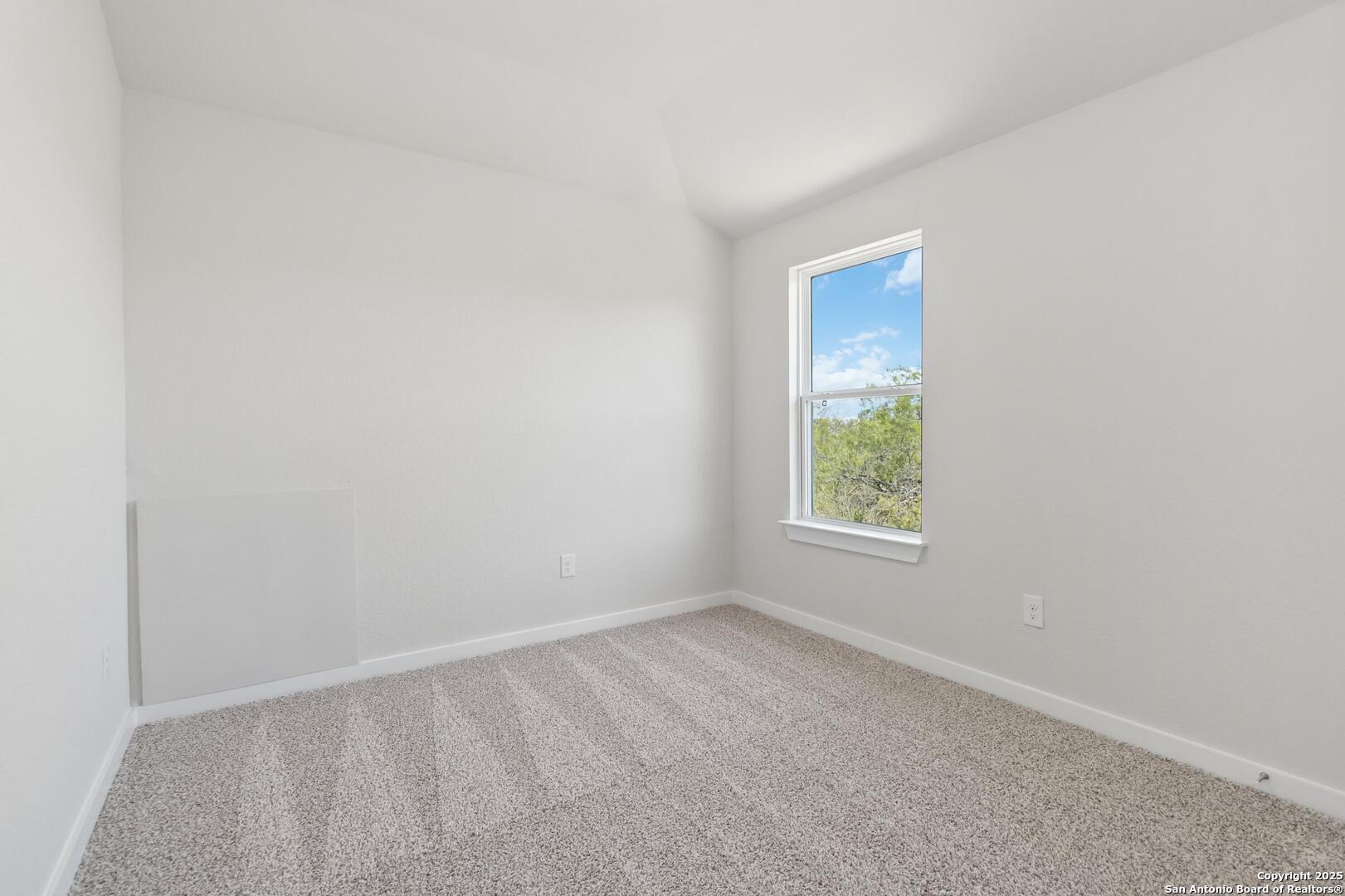 10303 Apple Pie Road San Antonio, TX 78224 - Photo 22 of 31 a view of an empty room with a window