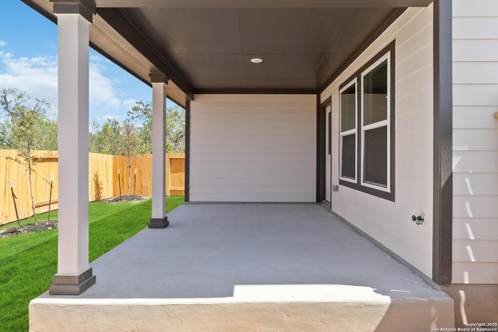 10303 Apple Pie Road San Antonio, TX 78224 - Photo 29 of 31 a view of backyard with large trees and plants