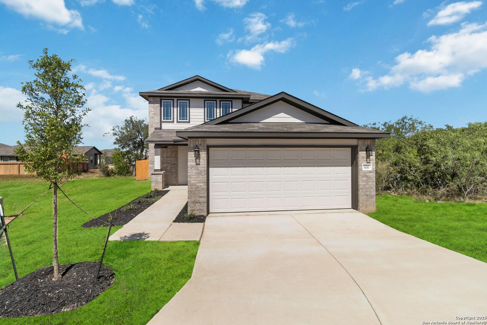 10303 Apple Pie Road San Antonio, TX 78224 - Photo 3 of 31 a front view of a house with a yard