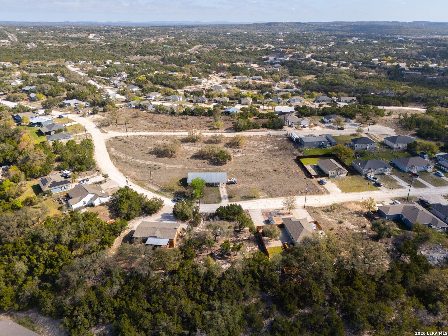 821 Cimarron Spring Branch, TX 78070 - Photo 8 of 10 an aerial view of residential building with parking space