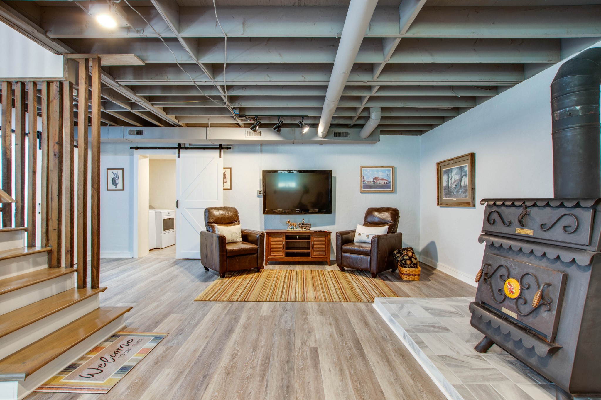 444 S Road Cottontown, TN 37048 - Photo 19 of 30 a living room with furniture and a flat screen tv