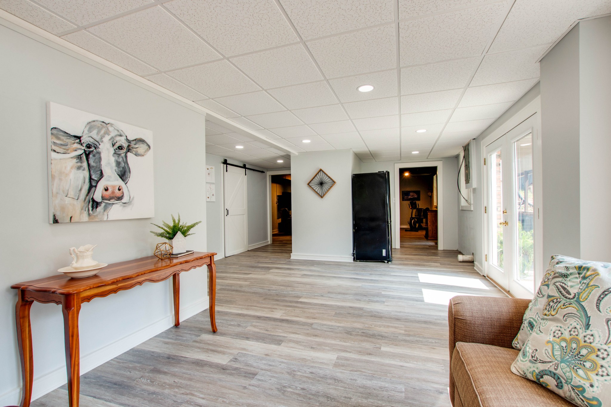 444 S Road Cottontown, TN 37048 - Photo 22 of 30 a living room with furniture and a wooden floor