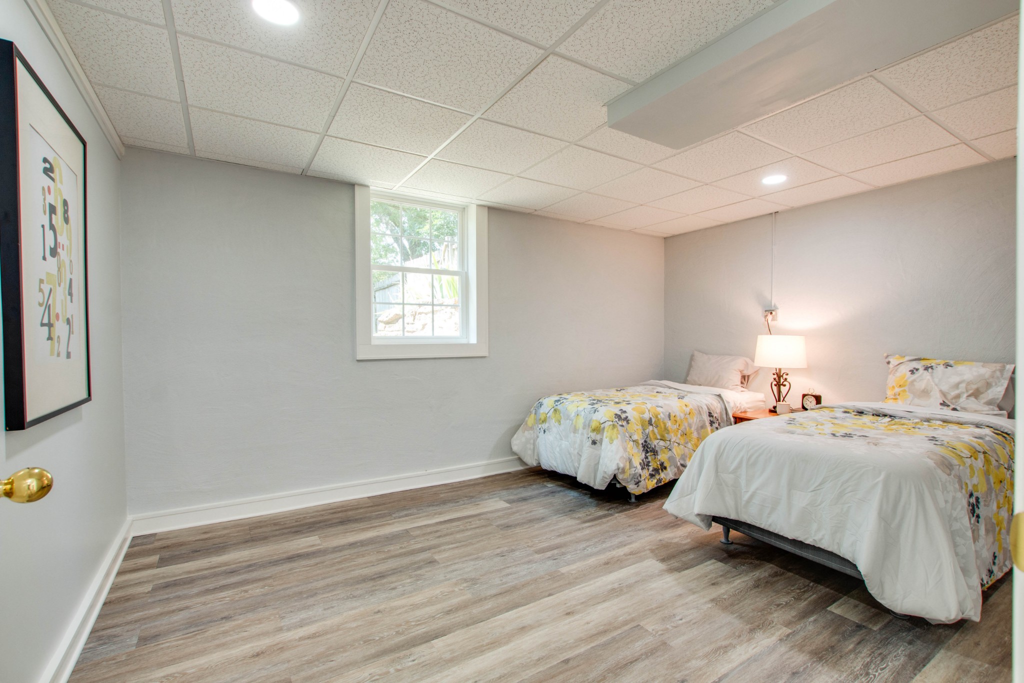 444 S Road Cottontown, TN 37048 - Photo 23 of 30 a spacious bedroom with two beds and a window