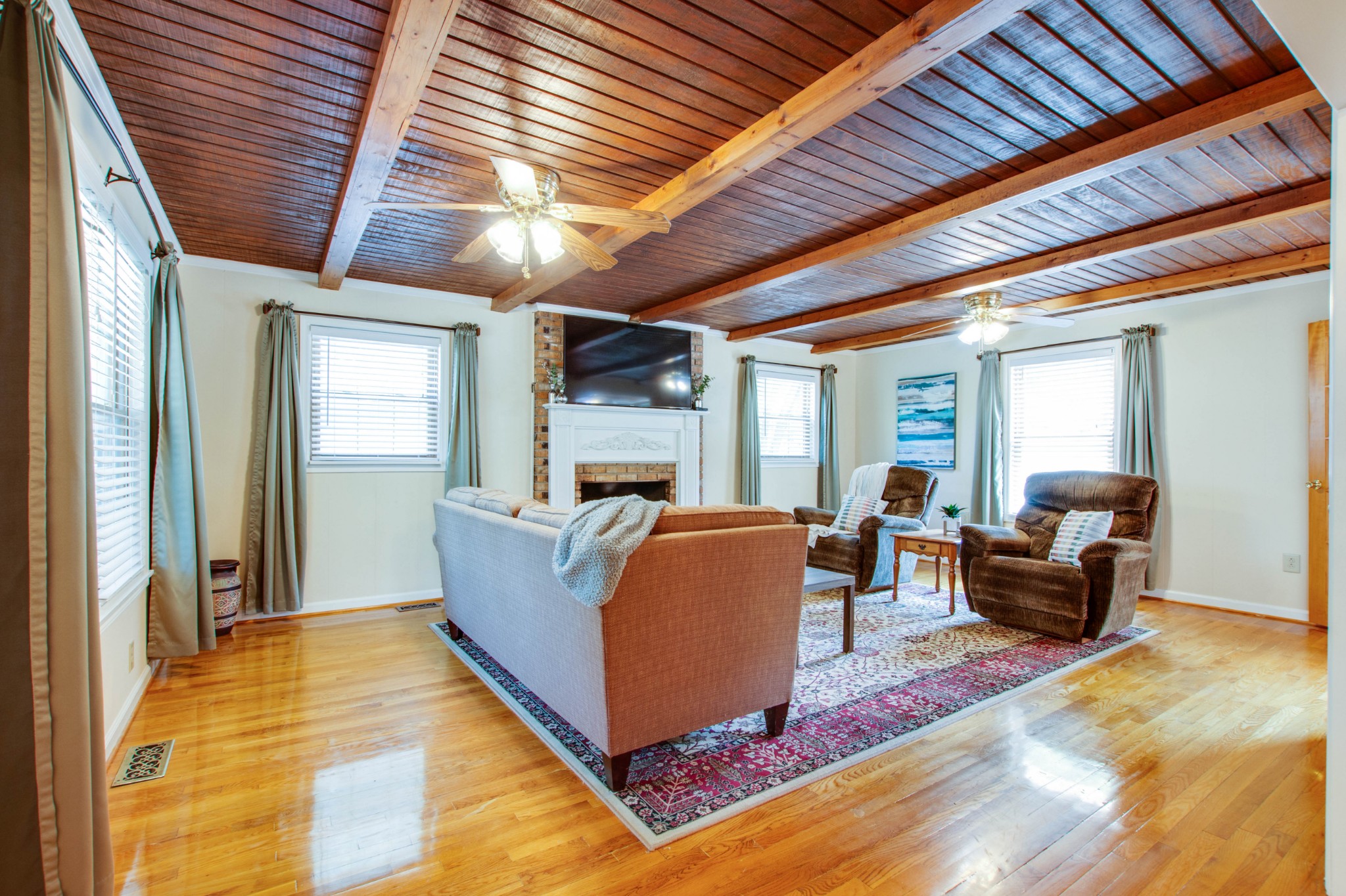444 S Road Cottontown, TN 37048 - Photo 7 of 30 a living room with furniture and a fireplace