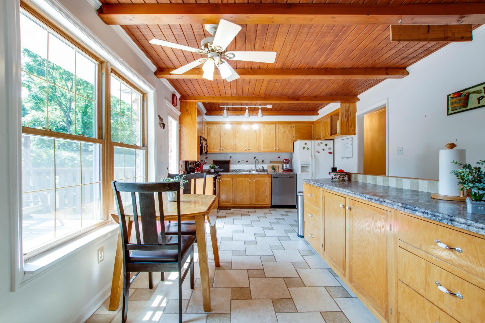 444 S Road Cottontown, TN 37048 - Photo 10 of 30 a kitchen with a table chairs and entryway
