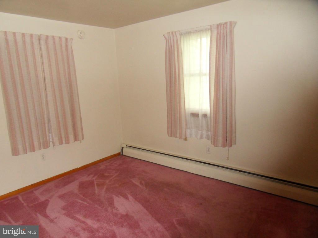 5880 Cloverdale Road Hurlock, MD 21643 - Photo 22 of 30 an empty room with windows