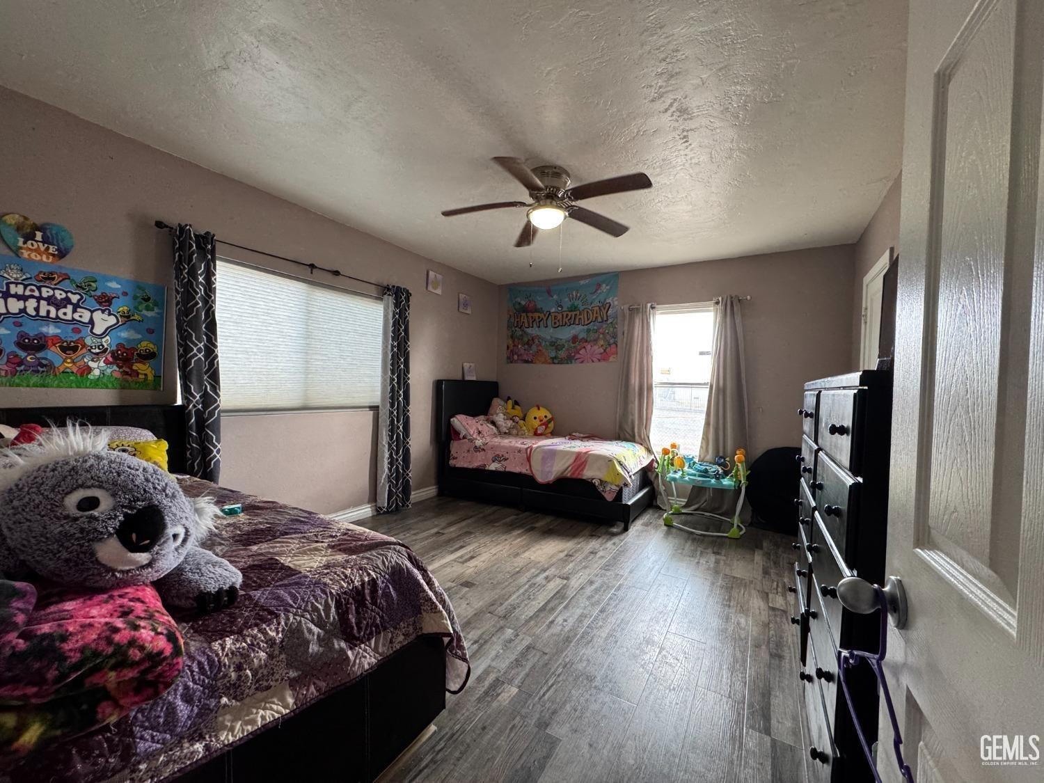 Undisclosed Address Bakersfield, CA 93305 - Photo 13 of 13 a bedroom with a bed furniture and a window