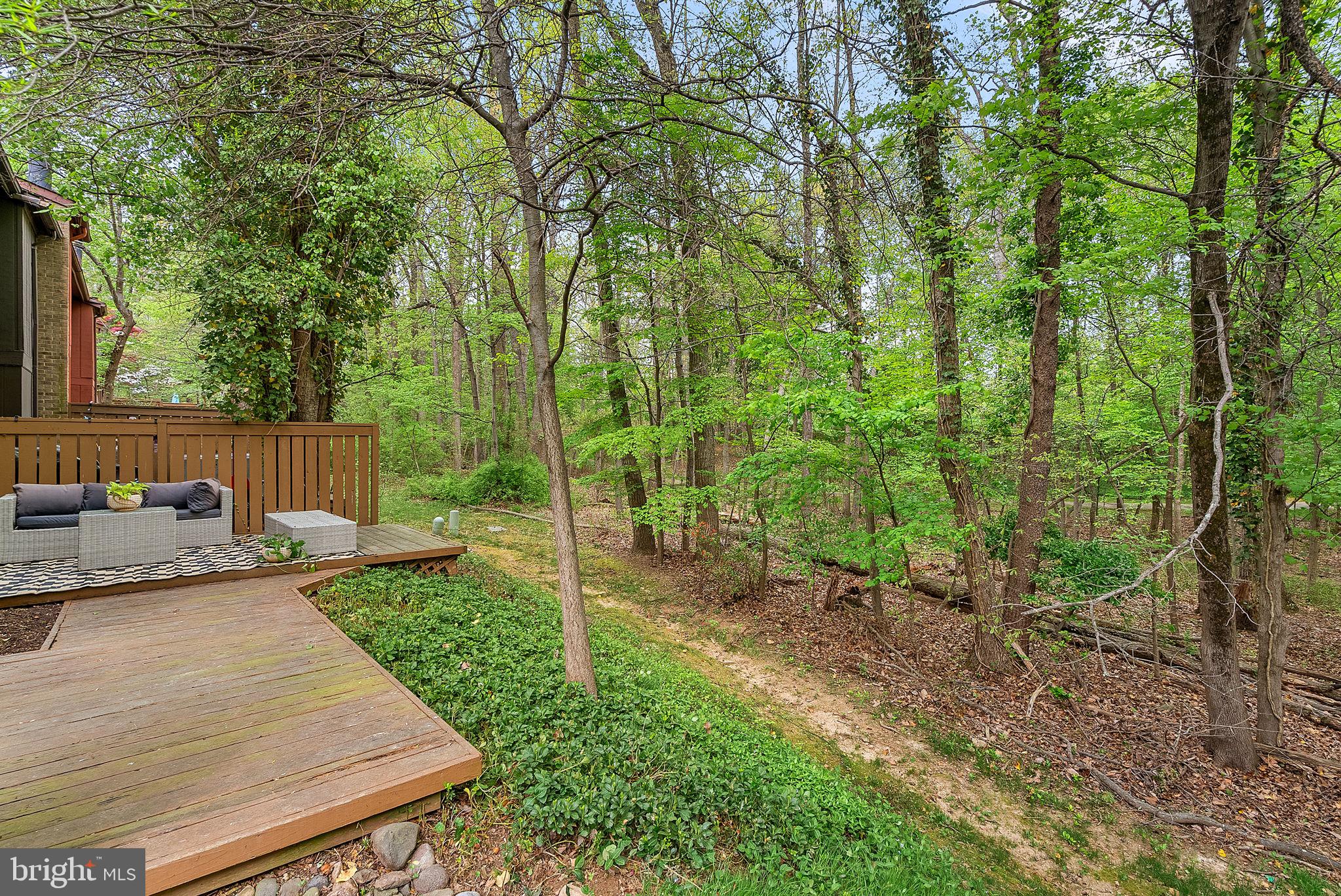 11907 Escalante Court Reston, VA 20191 - Photo 4 of 4 a view of a backyard with a small cabin