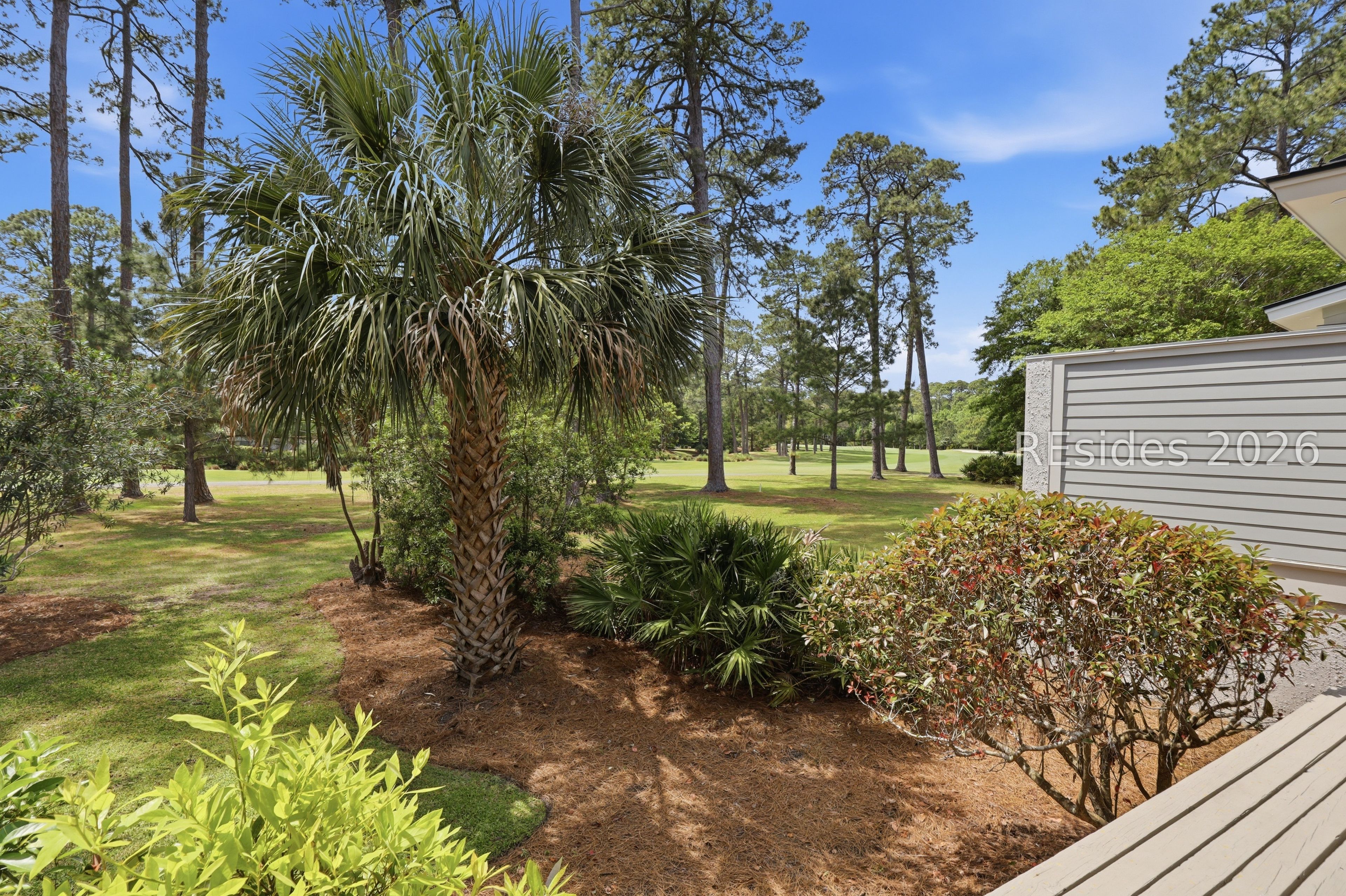 150 Otter Road Hilton Head Island, SC 29928 - Photo 27 of 56 View to the spacious backyard and golf course