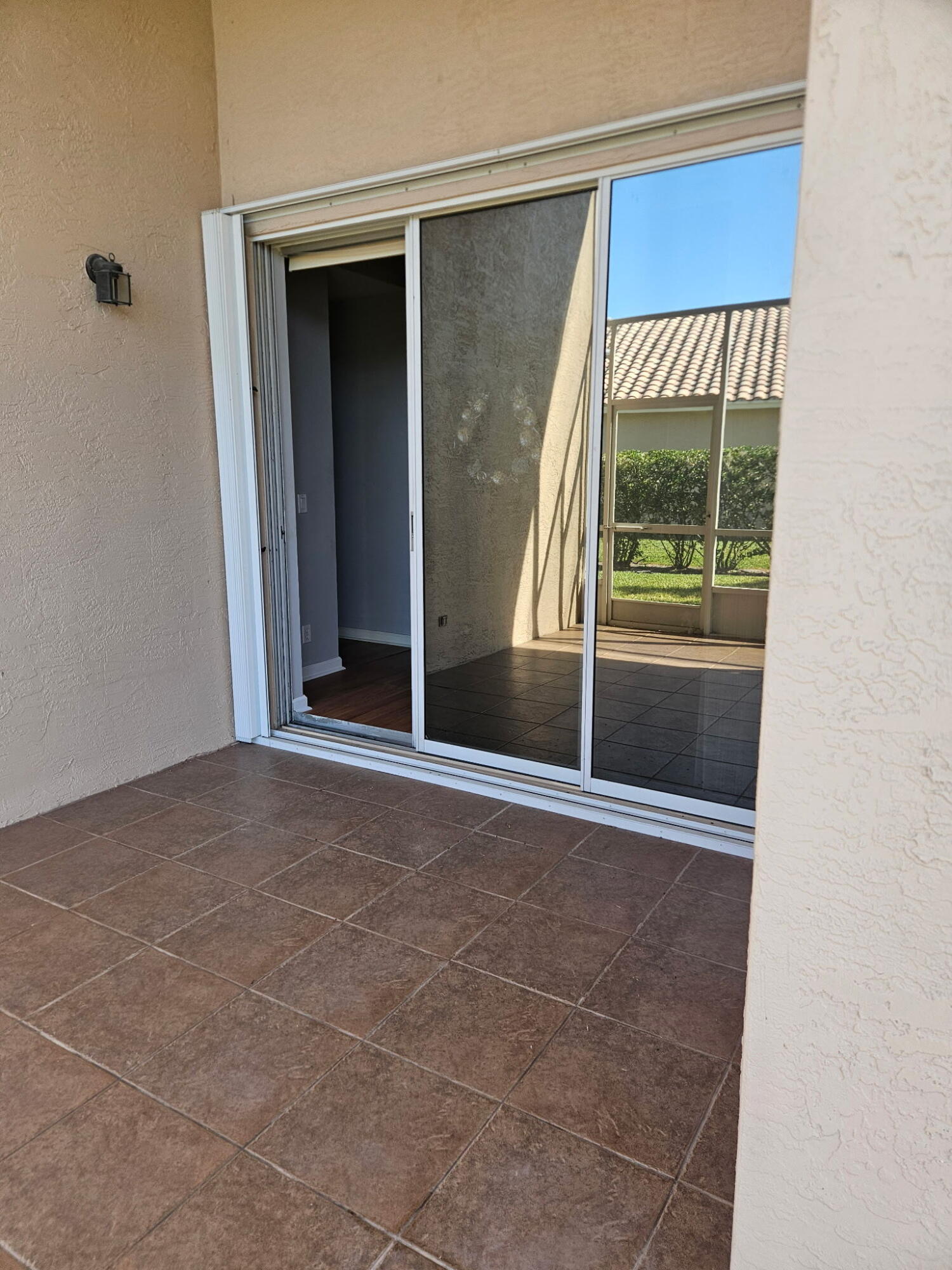 406 Springview Loop Port St. Lucie, FL 34986 - Photo 4 of 23 a view of an empty room with a window