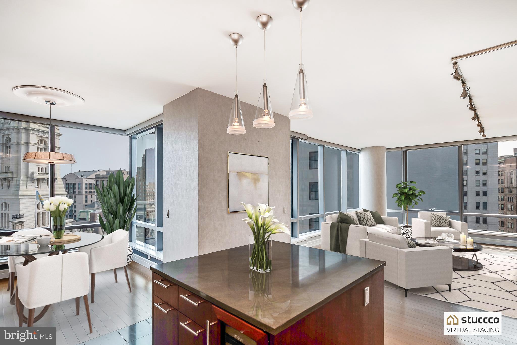 1414 South Penn Square, Unit 20B Philadelphia, PA 19102 - Photo 12 of 54 a view of kitchen island with stainless steel appliances