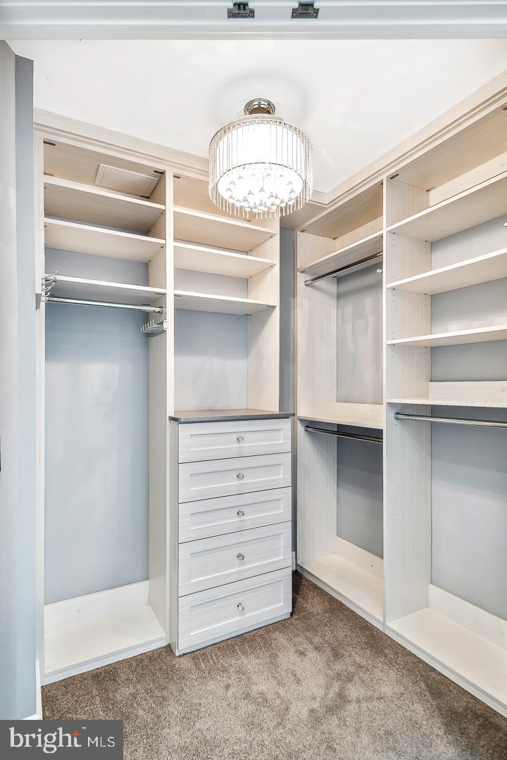 1414 South Penn Square, Unit 20B Philadelphia, PA 19102 - Photo 25 of 54 a view of walk in closet with empty racks