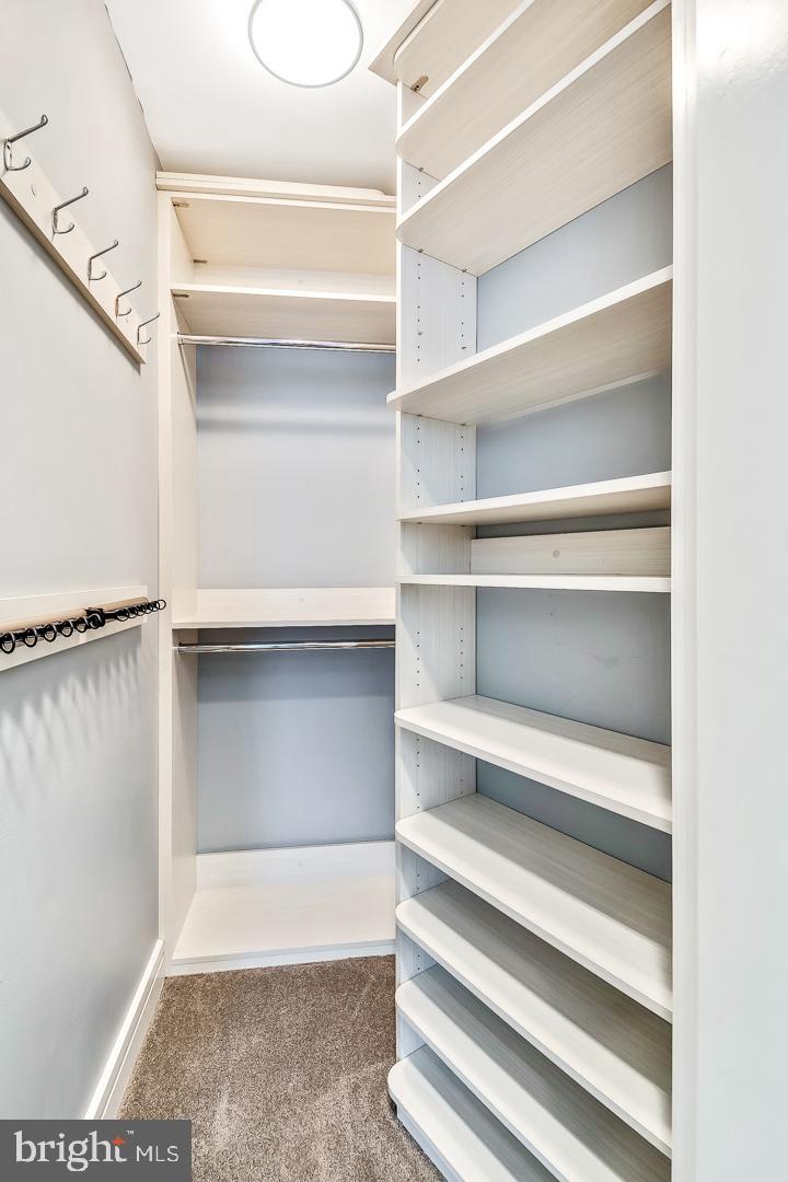 1414 South Penn Square, Unit 20B Philadelphia, PA 19102 - Photo 26 of 54 a view of walk in closet with empty racks