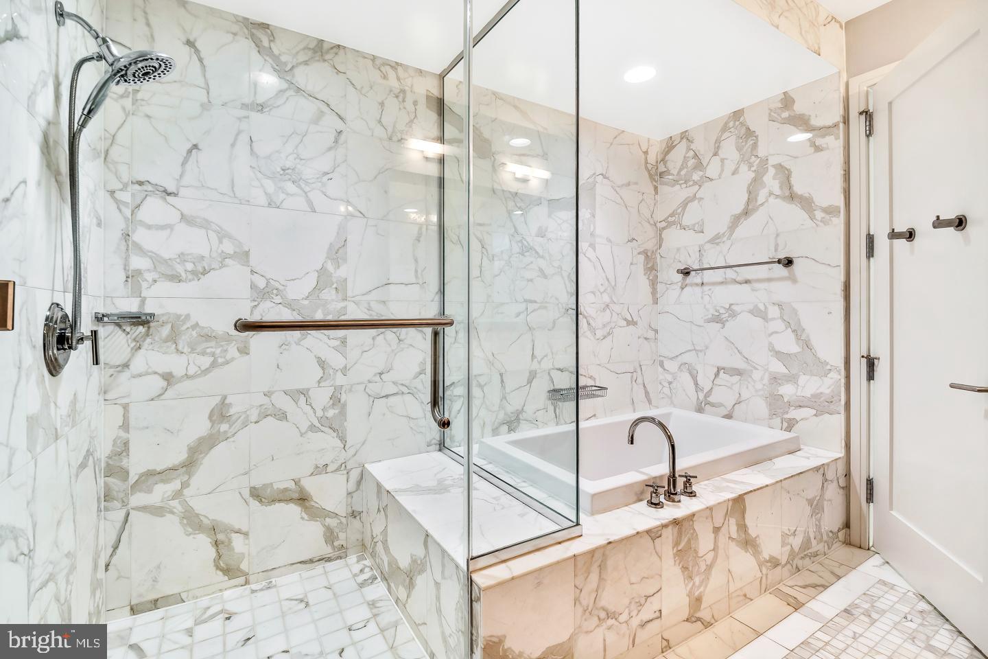 1414 South Penn Square, Unit 20B Philadelphia, PA 19102 - Photo 28 of 54 a bathroom with a bathtub and shower