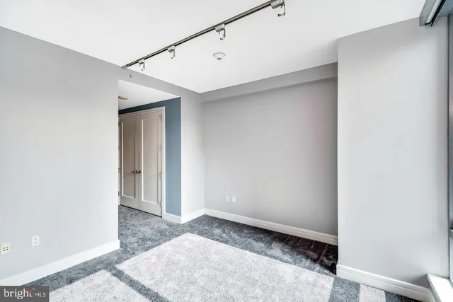 a view of an empty walk in closet