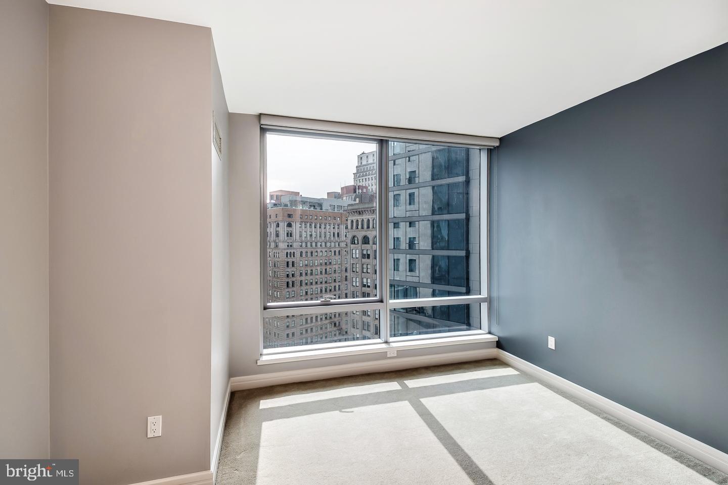 1414 South Penn Square, Unit 20B Philadelphia, PA 19102 - Photo 34 of 54 a view of an empty room with a window