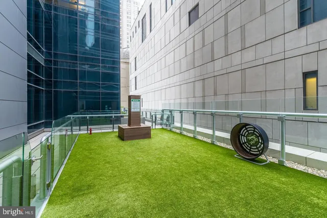 a room with gym equipment and a large window