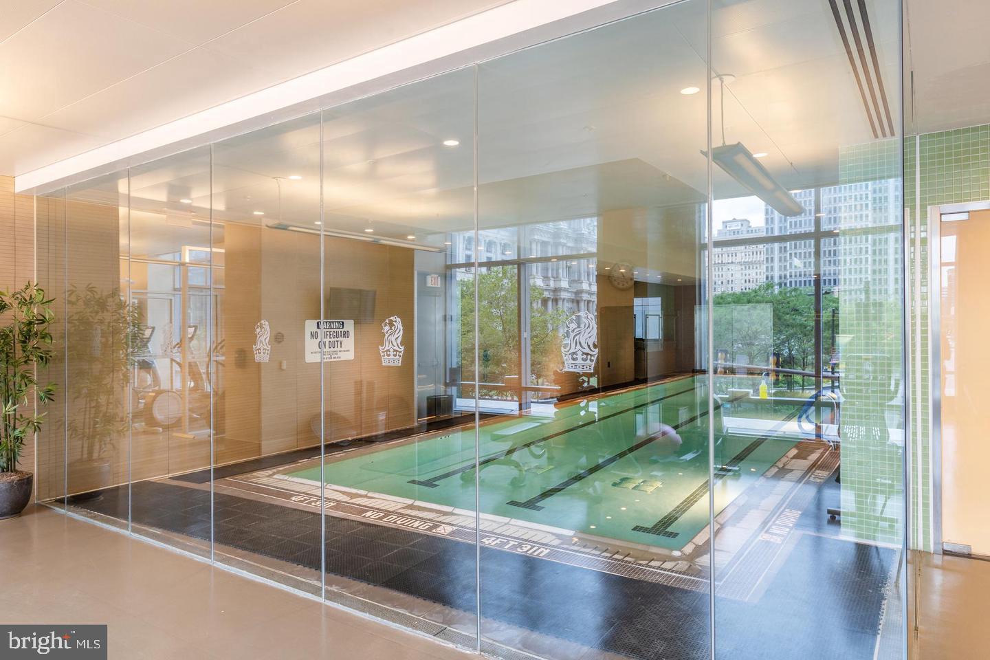 1414 South Penn Square, Unit 20B Philadelphia, PA 19102 - Photo 48 of 54 a room with pool table and windows