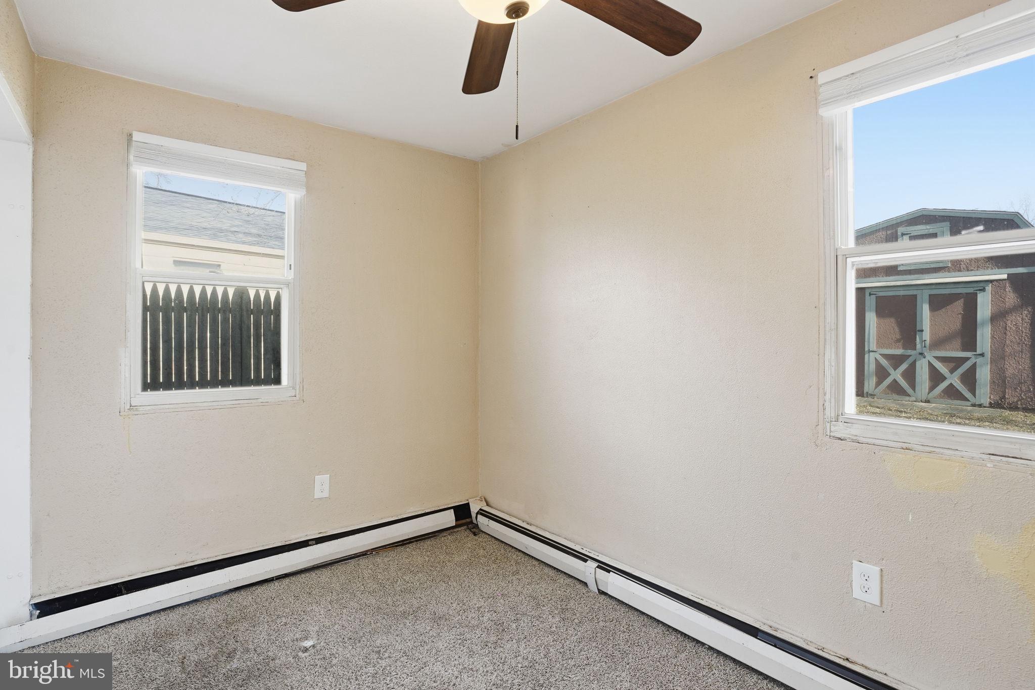 610 Wardour Road Glen Burnie, MD 21061 - Photo 11 of 19 a view of an empty room with a window