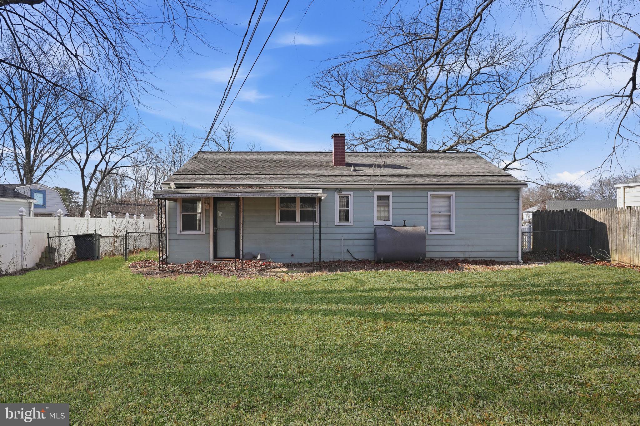 610 Wardour Road Glen Burnie, MD 21061 - Photo 18 of 19 a view of a house with a yard