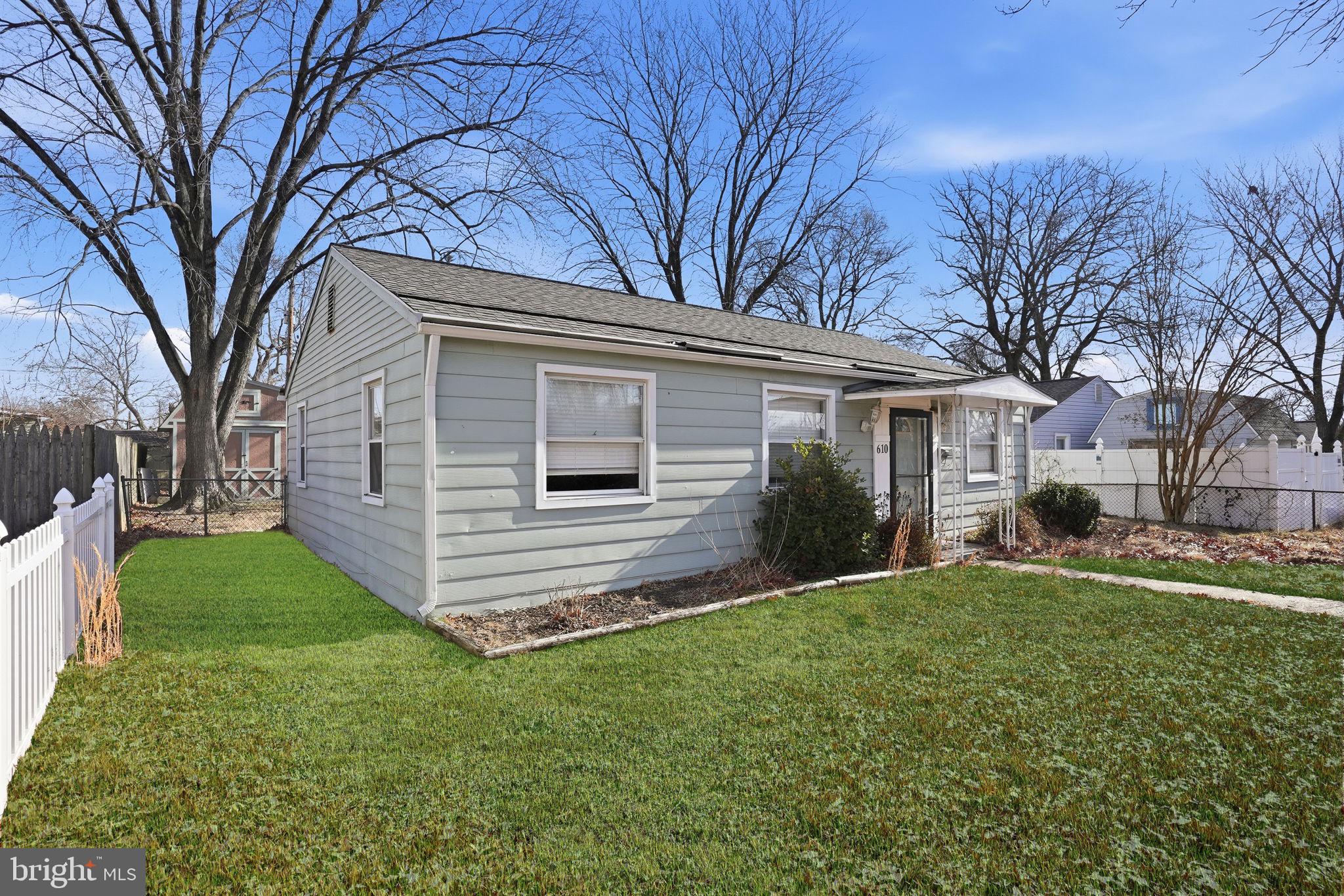 610 Wardour Road Glen Burnie, MD 21061 - Photo 2 of 19 a front view of house with yard and green space