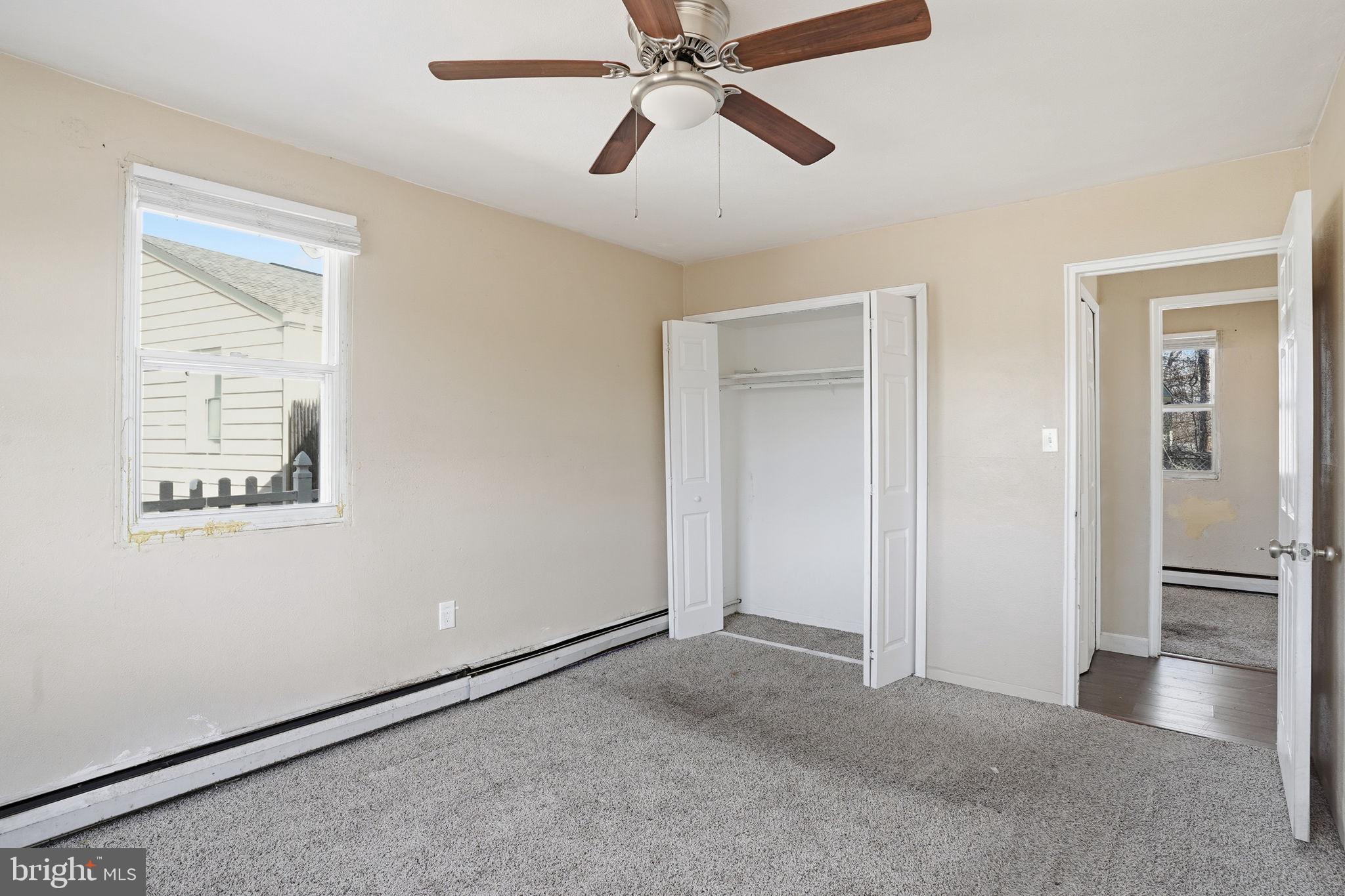 610 Wardour Road Glen Burnie, MD 21061 - Photo 10 of 19 a view of a room with window and ceiling fan