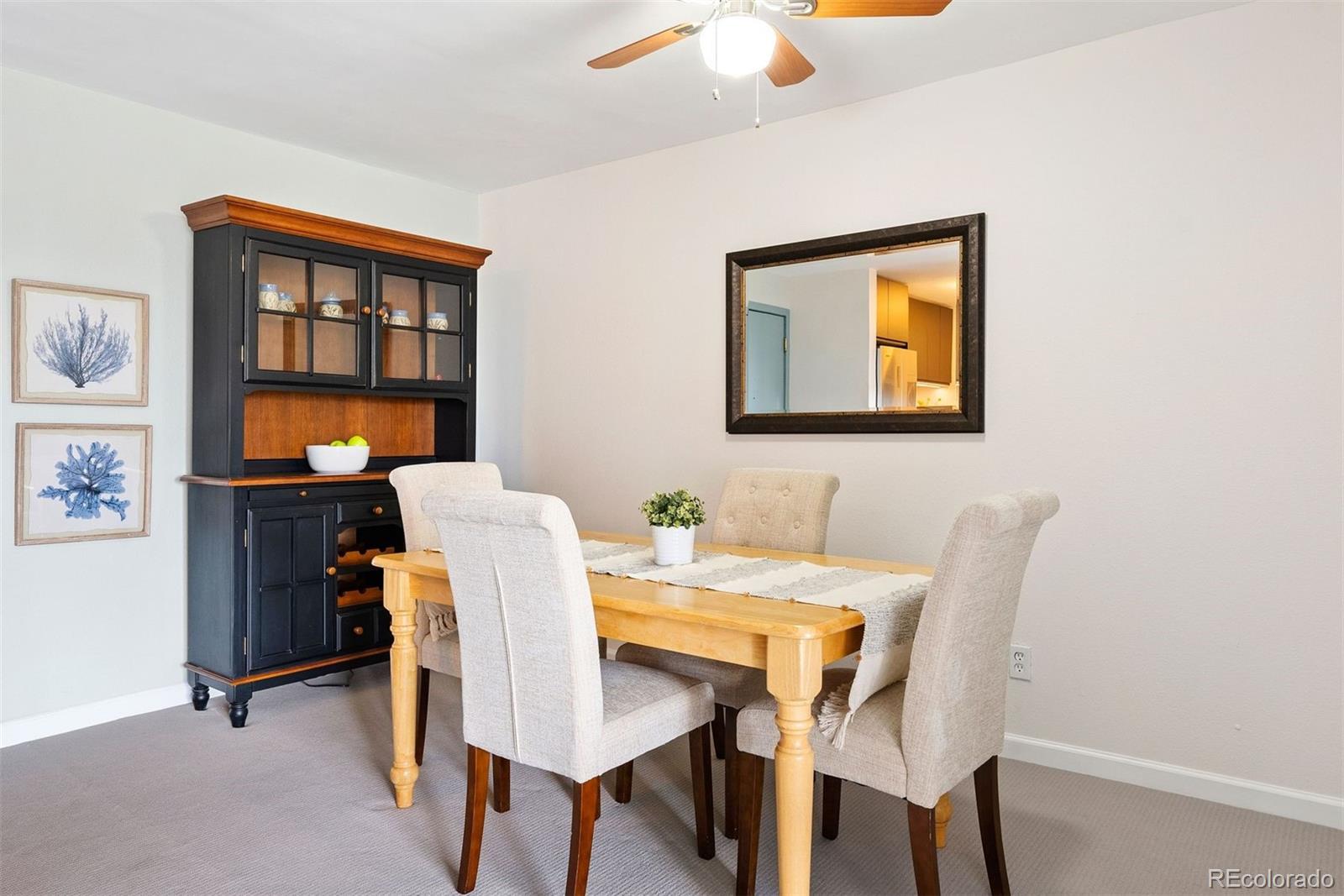 2 Adams Street, Unit 806 Denver, CO 80206 - Photo 21 of 34 a dining room with furniture and window