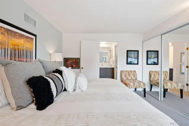 a large white kitchen with lots of counter top space