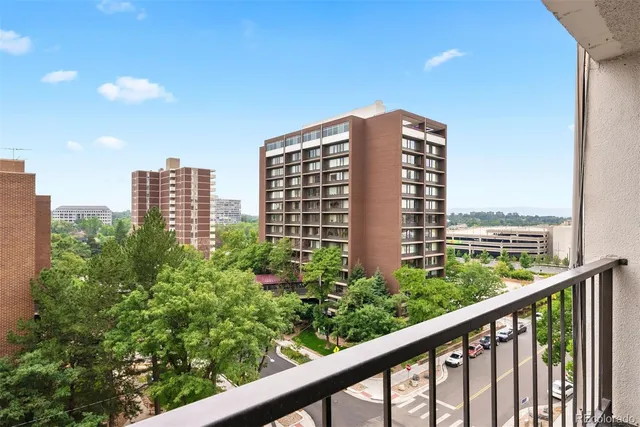 a kitchen with a sink and a stove top oven