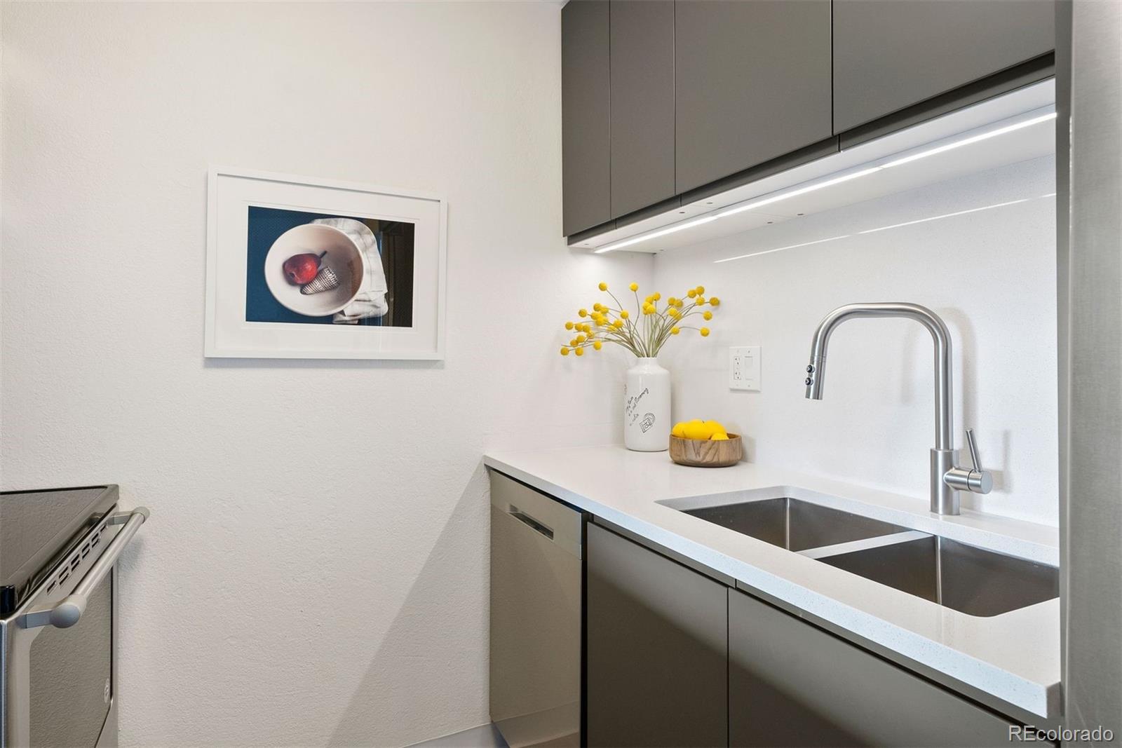 2 Adams Street, Unit 806 Denver, CO 80206 - Photo 8 of 34 a close view of sink and tap