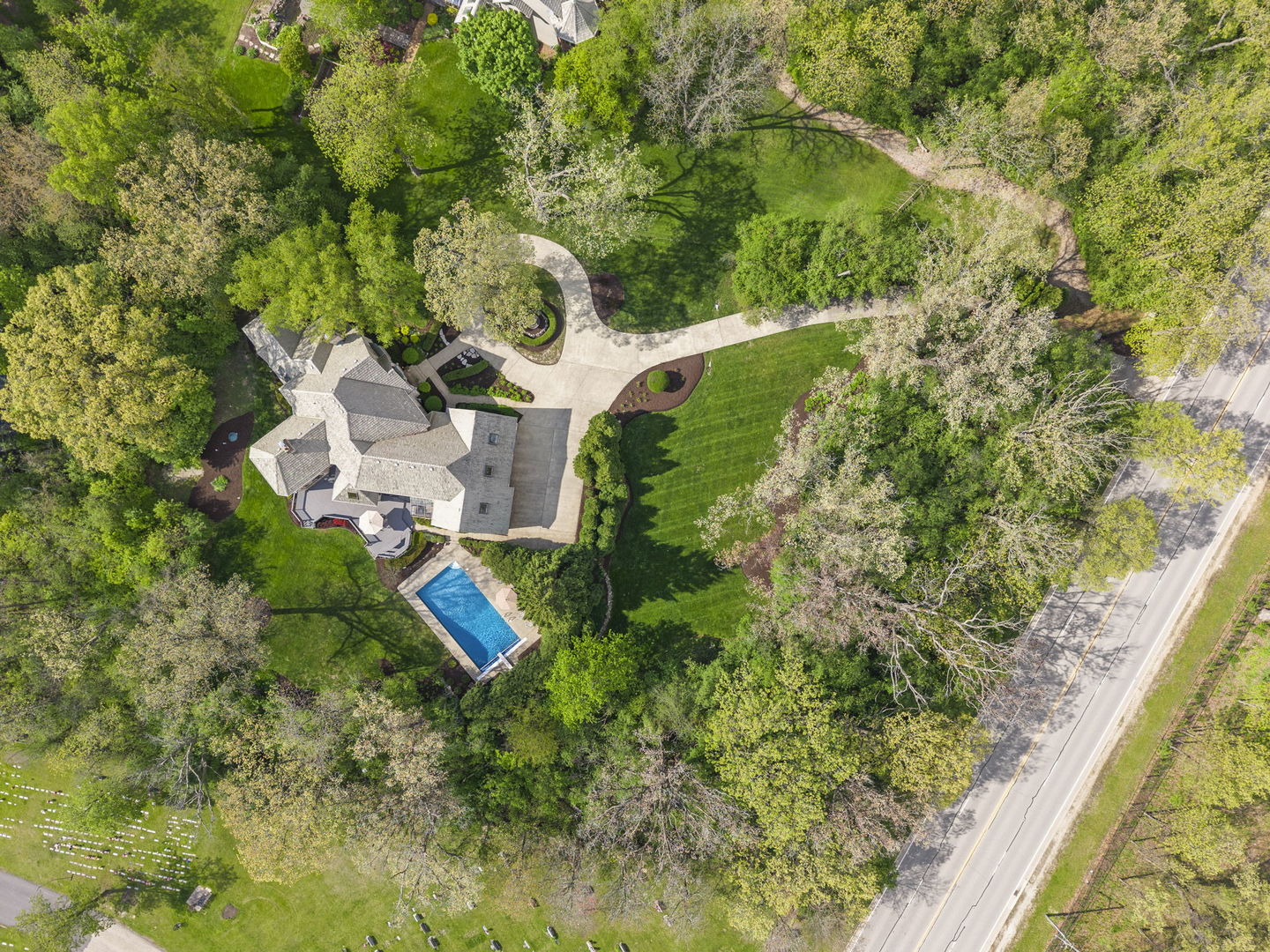 1S151 Winfield Road Wheaton, IL 60189 - Photo 6 of 73 an aerial view of a house with a yard and trees