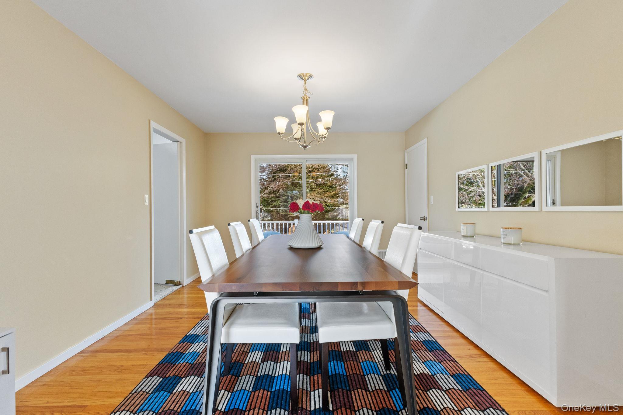 15 Meadow Place Rye, NY 10580 - Photo 12 of 39 Another view of dining room shows sliding glass doors leading to deck.