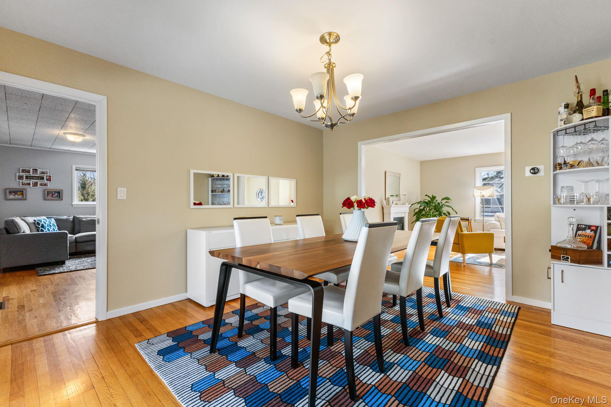 15 Meadow Place Rye, NY 10580 - Photo 13 of 39 Dining room flows back into the living room on the right and also into the family room on the left.