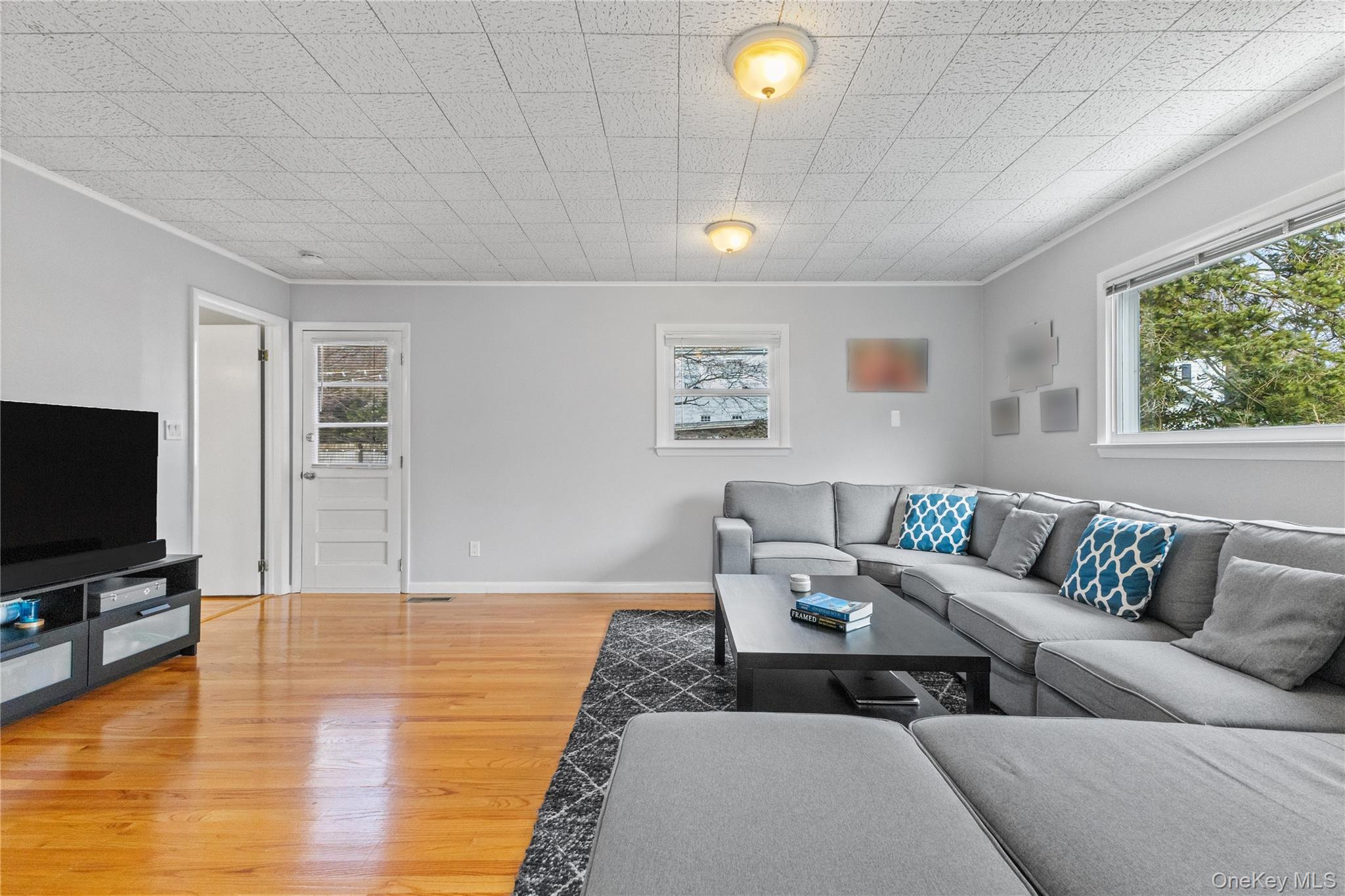 15 Meadow Place Rye, NY 10580 - Photo 14 of 39 Family room (which could be used as another bedroom) offers gleaming hardwood floors, a large closet and another exit door to the back deck.