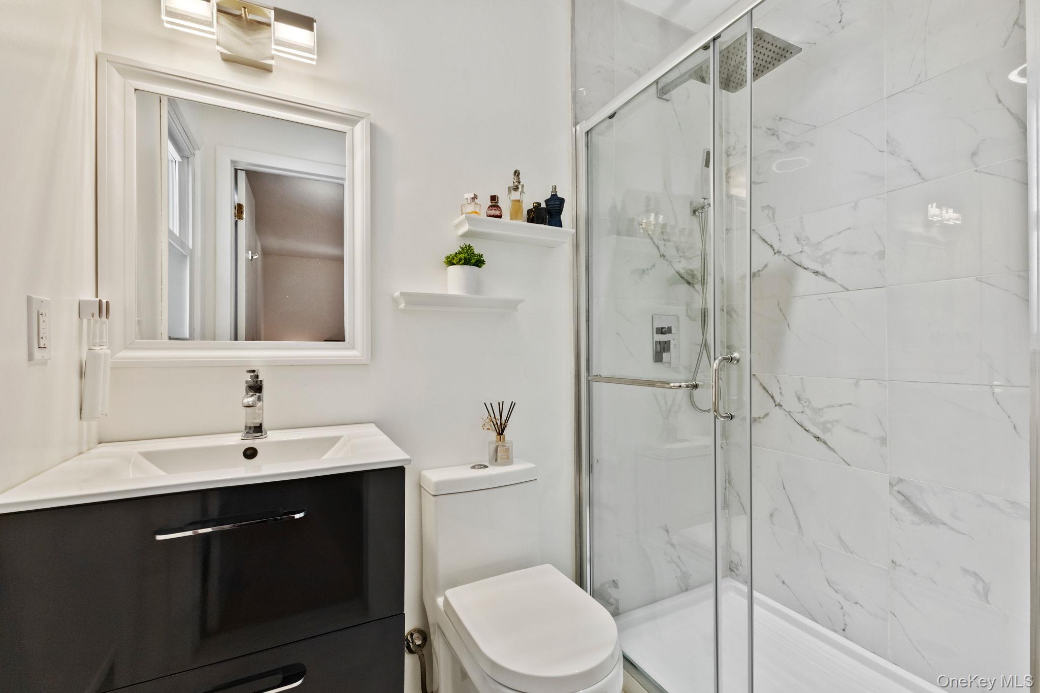 15 Meadow Place Rye, NY 10580 - Photo 24 of 39 Primary bedroom fully updated ensuite bath.