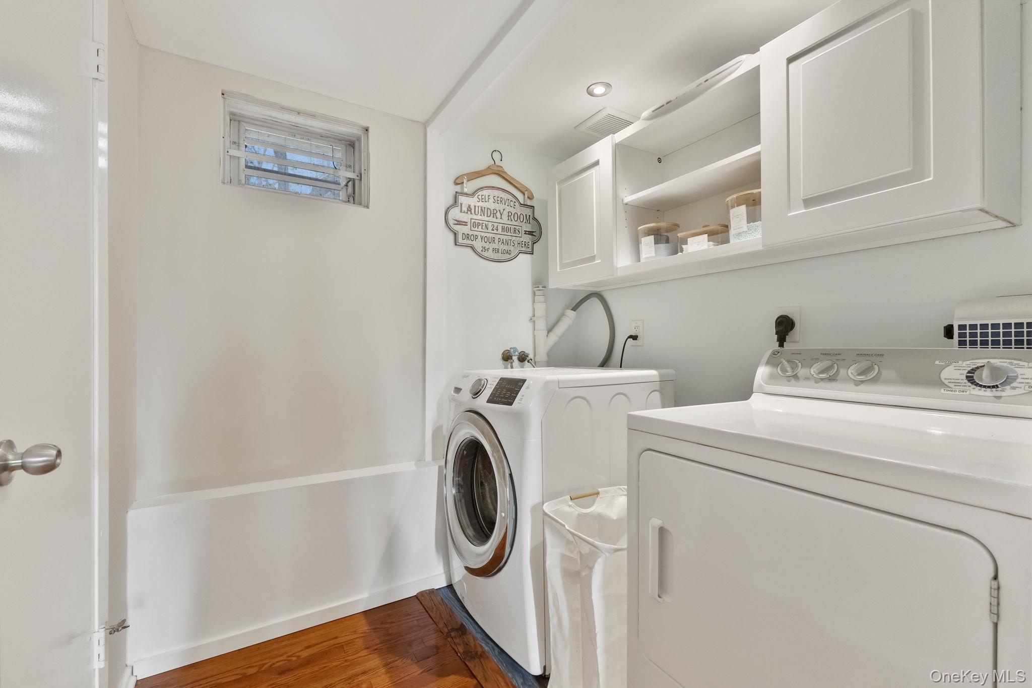 15 Meadow Place Rye, NY 10580 - Photo 28 of 39 Lower-level laundry area with built-in cabinets.