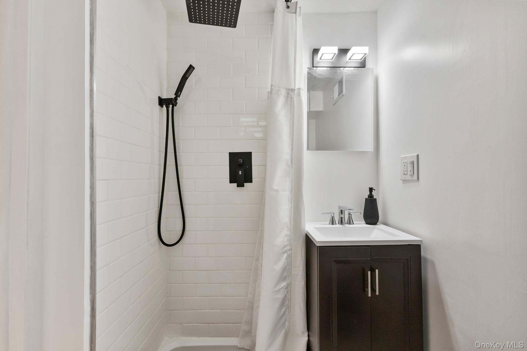 15 Meadow Place Rye, NY 10580 - Photo 29 of 39 Another full, updated bath located on the lower level across from the laundry area.