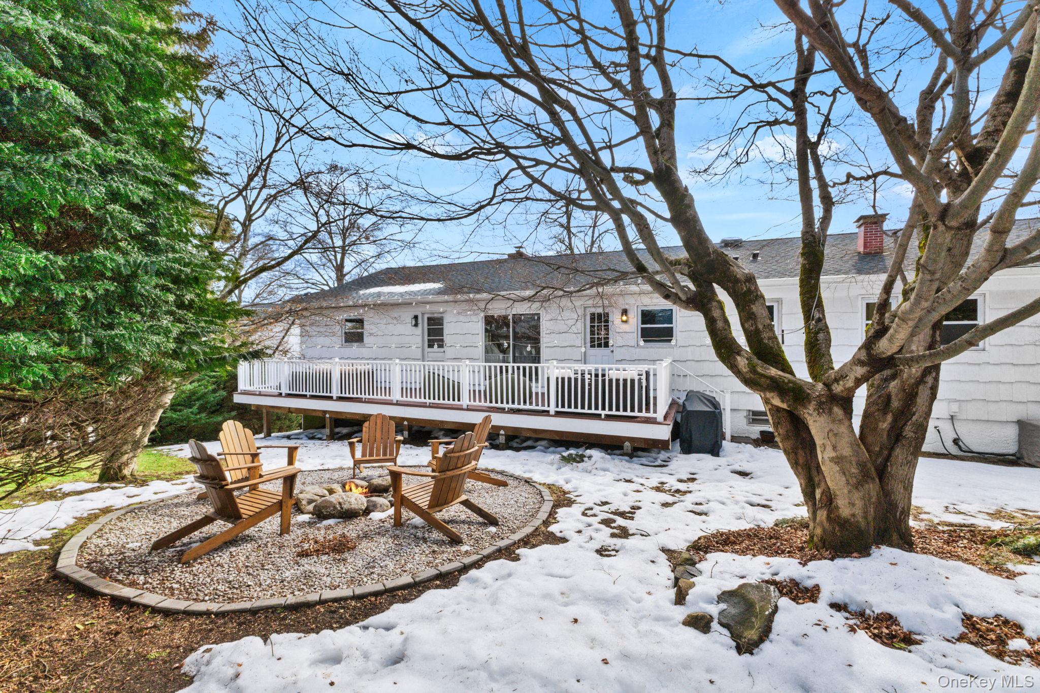 15 Meadow Place Rye, NY 10580 - Photo 30 of 39 Lovely and private backyard with deck and firepit.