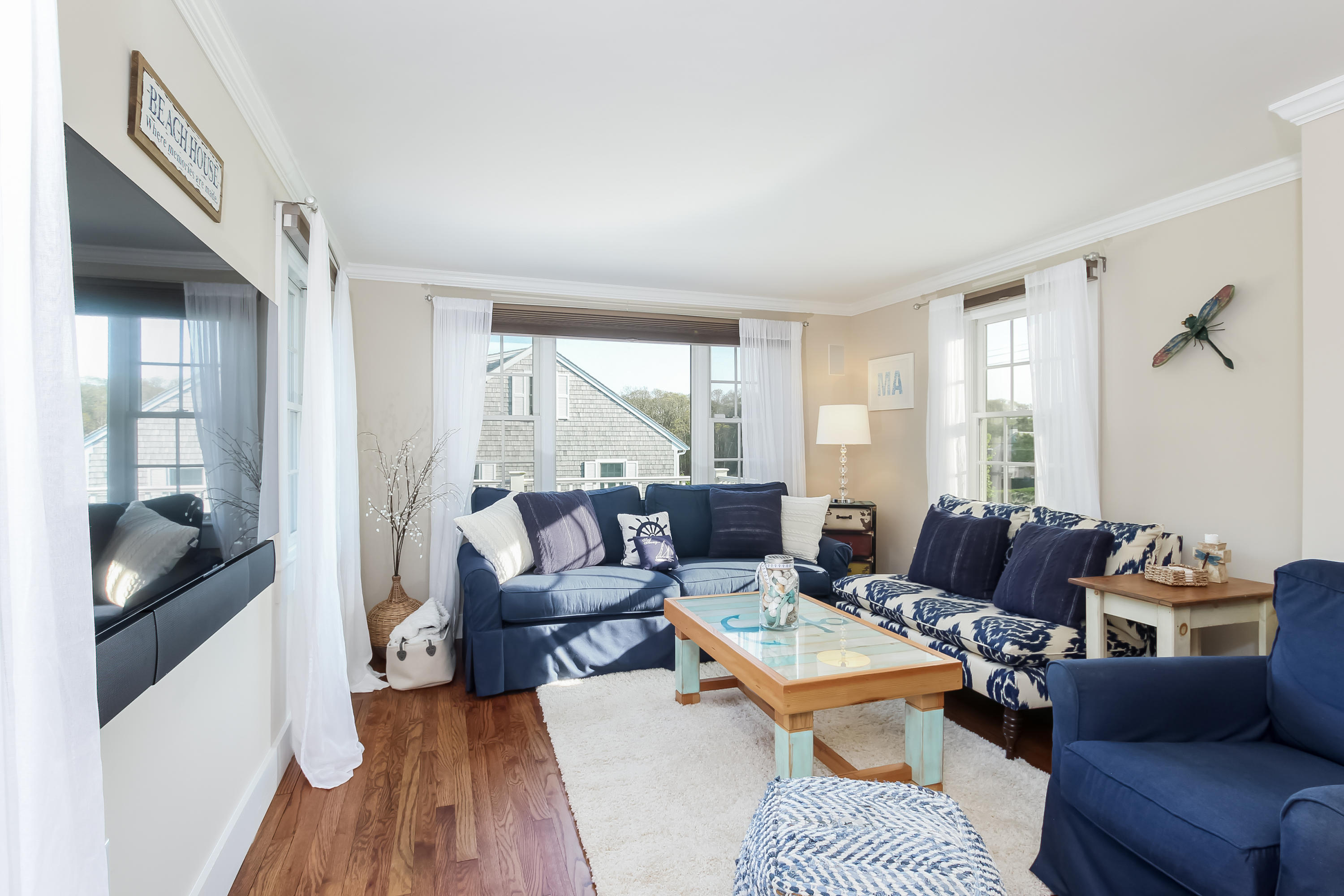 15 Colonial Way Harwich Port, MA 02646 - Photo 15 of 28 a living room with furniture and wooden floor