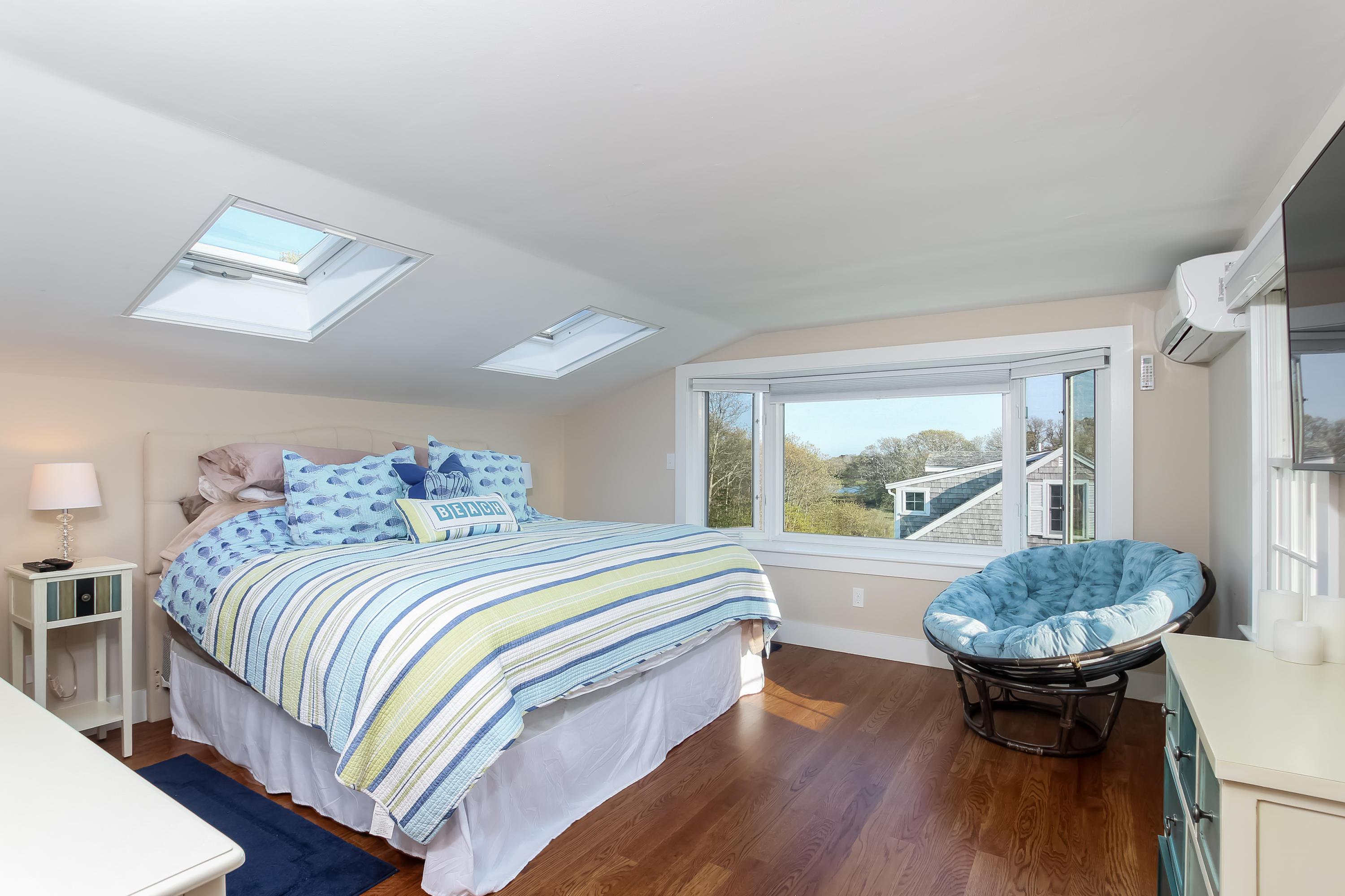 15 Colonial Way Harwich Port, MA 02646 - Photo 20 of 28 a bedroom with a bed and a mirror on the dresser