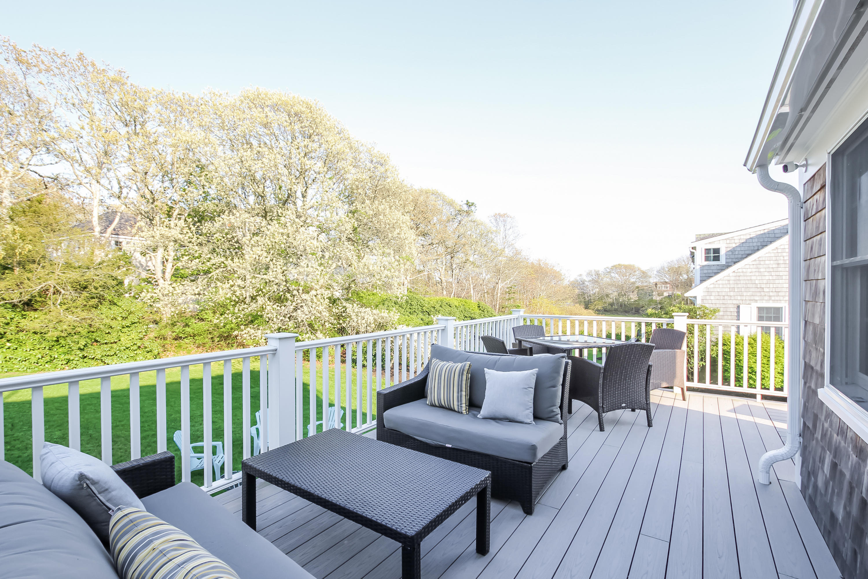 15 Colonial Way Harwich Port, MA 02646 - Photo 24 of 28 a balcony with wooden floor table and chairs