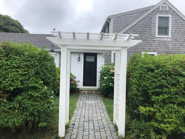 15 Colonial Way Harwich Port, MA 02646 - Photo 4 of 28 a view of a house with potted plants