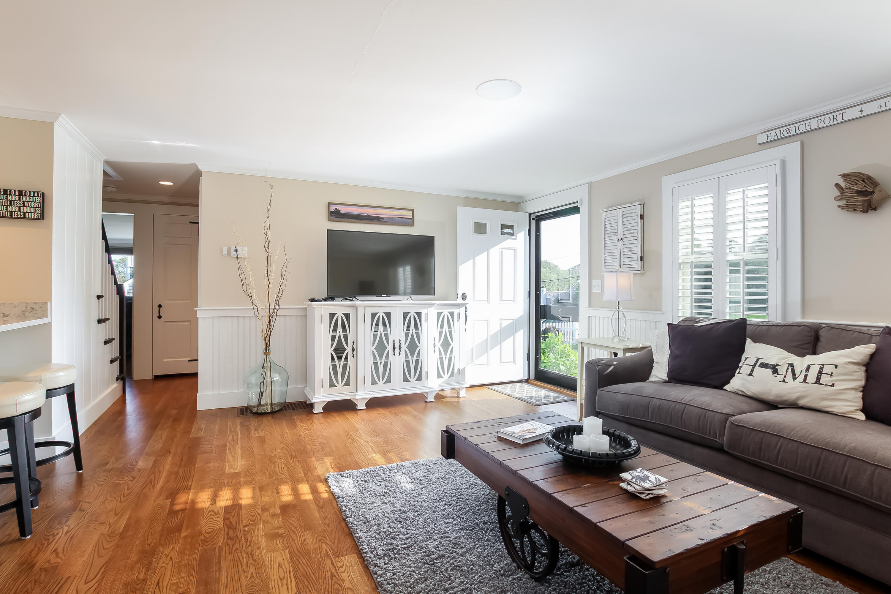 15 Colonial Way Harwich Port, MA 02646 - Photo 8 of 28 a living room with furniture and a flat screen tv