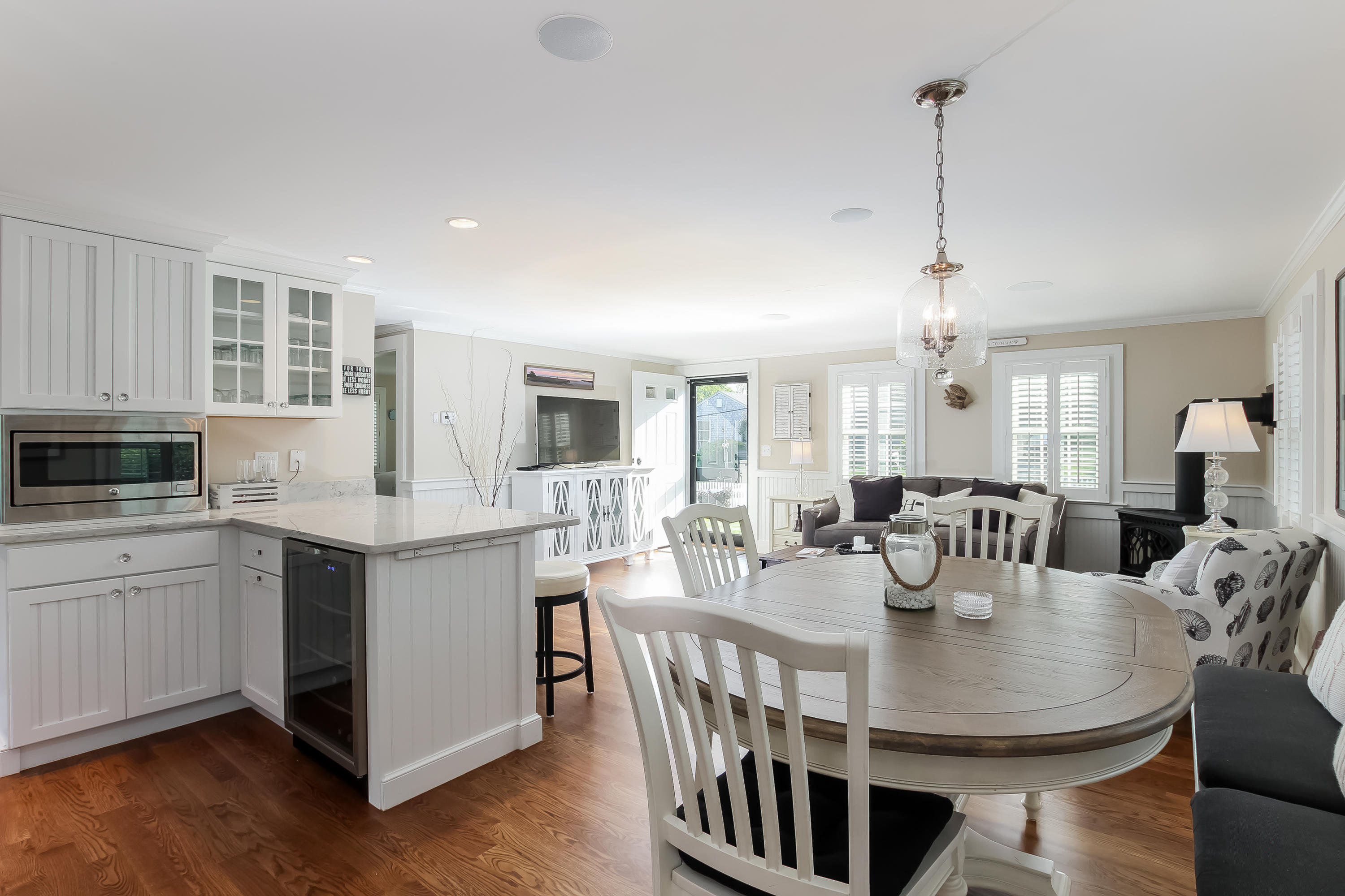 15 Colonial Way Harwich Port, MA 02646 - Photo 10 of 28 a view of a dining room with furniture window and wooden floor